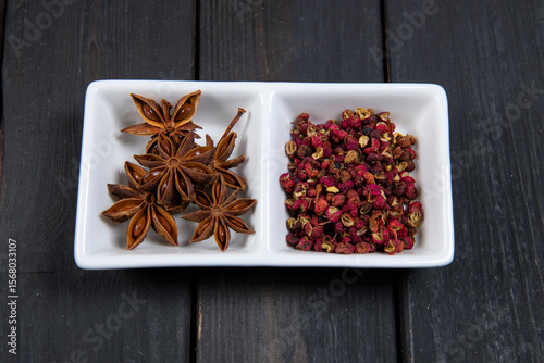 Fototapeta Naklejka Na Ścianę i Meble -  Star anise and pepper spice combination