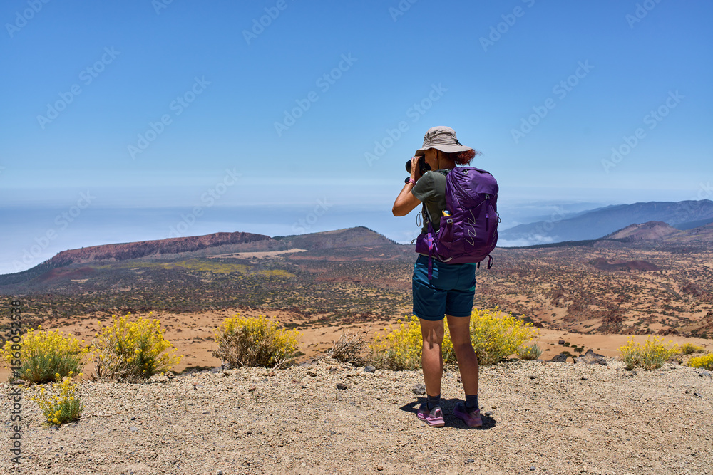Fototapeta premium Hiker photographing La Fortaleza