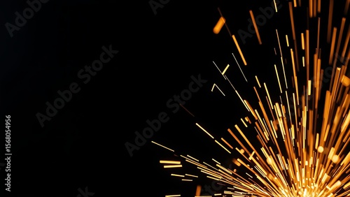 A close-up of glowing sparks against a dark background, capturing the intensity of industrial metalworking.