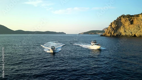 Two Luxury Yachts cruising in the Mediterranean