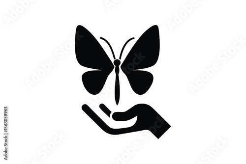 A stylized black silhouette of a butterfly gently landing on an open hand symbolizing freedom transformation and care with a clean white background