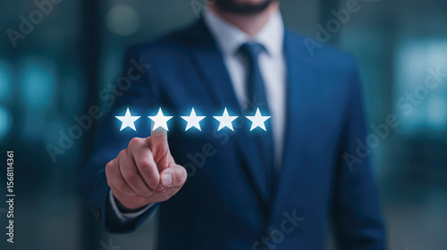A businessman in a suit is giving a five-star rating by touching transparent digital stars in a futuristic, blurred office setting.