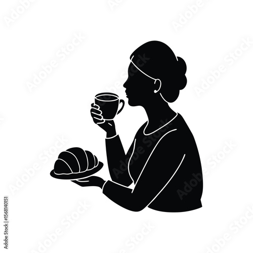 woman sipping coffee with a croissant