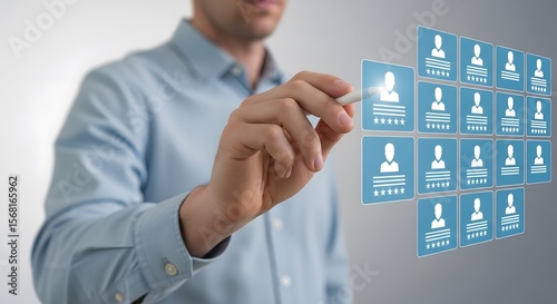 Businessman interacts with candidate profiles in a virtual job recruitment process, evaluating job applications using modern technology.