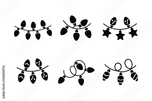 Black silhouette festive string lights with various bulb shapes and decorative elements