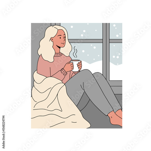Young woman relaxing with a cup of tea by the window in winter  