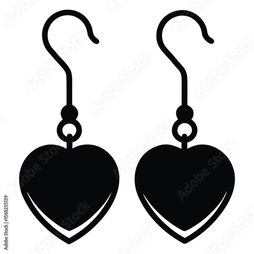 Pair of black heart shaped dangle earrings isolated on white background