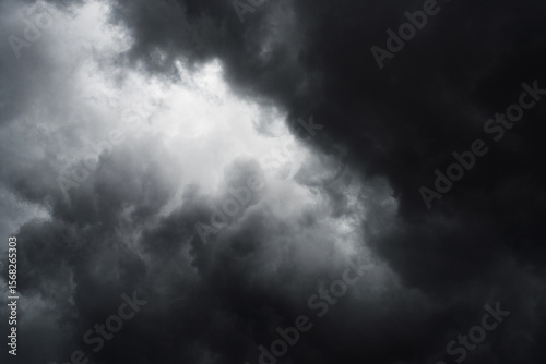 Εκτύπωση καμβά Dramatic overcast sky filled with dense, layered black clouds before a storm