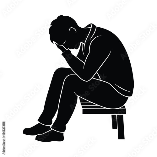 Sad Man Silhouette Sitting with Head Down