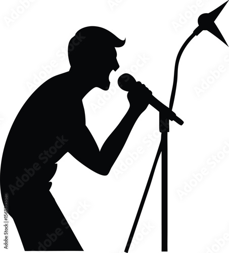 Black Silhouette of Singer Performing on Stage with Microphone Stand singing