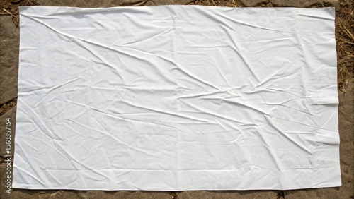 Wrinkled White Plastic Sheet on Ground: Grunge Texture Background