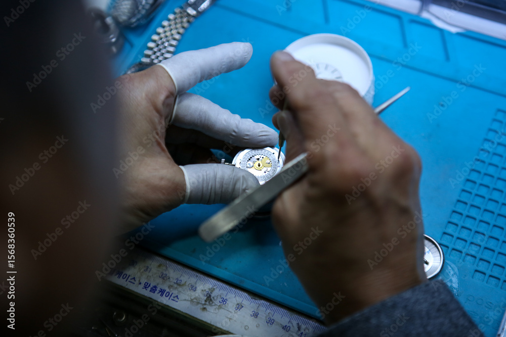 Obraz premium Repairing a wristwatch. Watch repair
