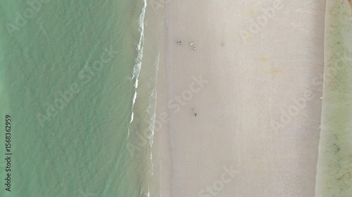 Remote beach with shallow clear water