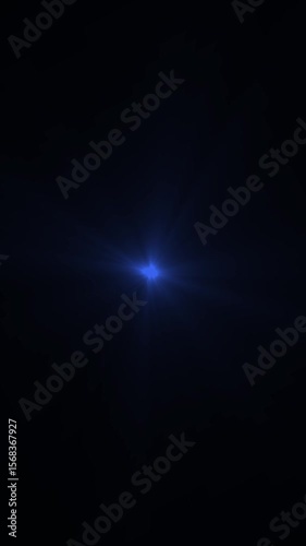 Explosion of light and lens flare shying animation. green star light effect. Optical glowing lens flares light streaks shine animation on black background.