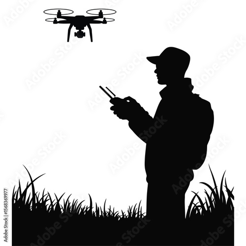 Silhouette of photographer holding remote control as drone flies overhead on black and white background