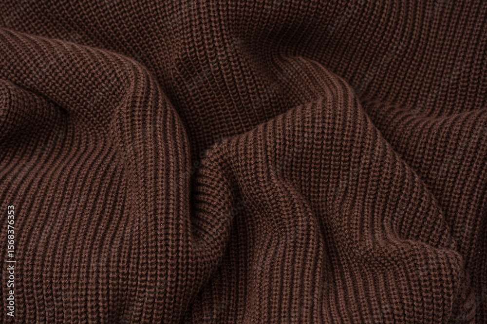 Fototapeta premium Brown sweater texture as a background.