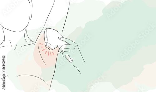 Woman using laser hair removal device on her underarm  
