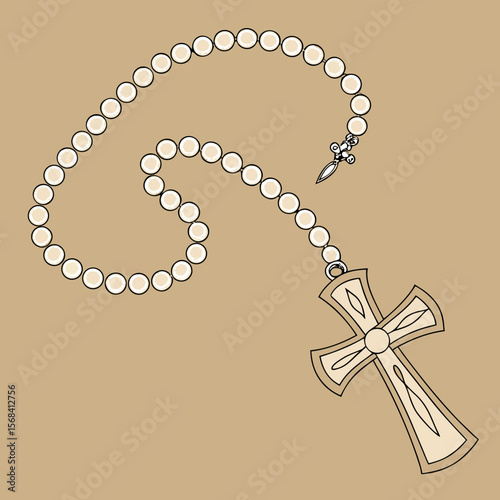 Rosary beads with cross on a beige background  