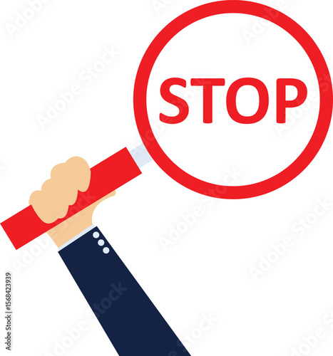Hand holding up stop sign


