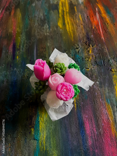 Tableau sur toile Floral candle Bouquet on Textured Surface