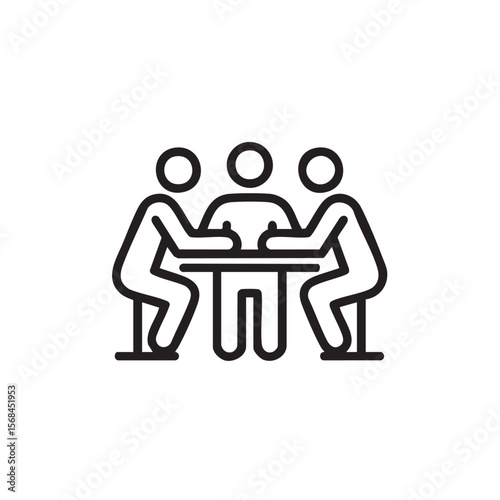 Discussion among three people seated at a table for collaboration