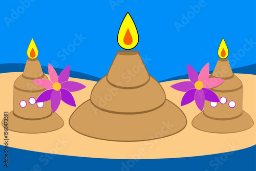 Sand Pagodas With Flowers And Candles On Beach At Night