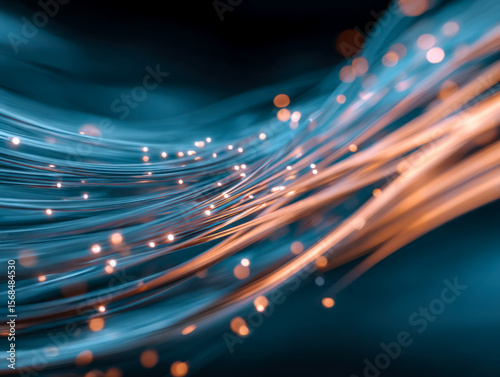 Abstract light streaks and glowing particles in motion