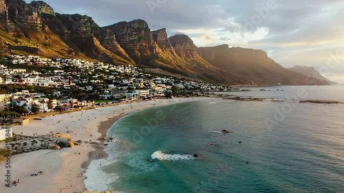 Scenic aerial view of Camps Bay beach, Cape Town, South Africa at sunset