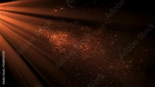 Abstract light rays and particles in dark space with warm orange glow