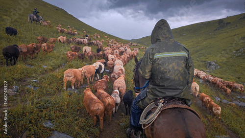 Kazakh herders ride horses during seasonal migration