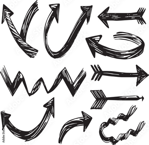 Various hand drawn black ink arrows pointing in different directions on a white background surface