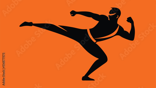 Silhouette of a martial artist performing a high kick on orange background