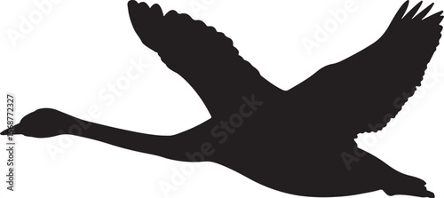 Silhouette of a swan gracefully flying with wings spread wide