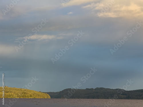A west coast rains storm on a wild untouched lake.