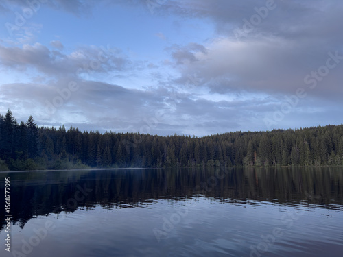 A west coast rains storm on a wild untouched lake.