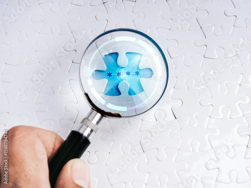 Wallpaper Mural Cyber security, password protection, data secure concept. Close-up asterisk symbol on space of last missing piece, focus in digital magnifying glass lens, on white jigsaw puzzle background. Torontodigital.ca