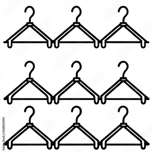 Row of identical black clothing hangers on a white background