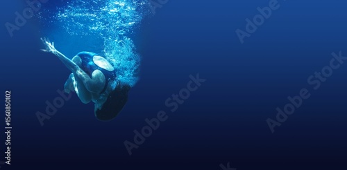 Man swimming in blue water
