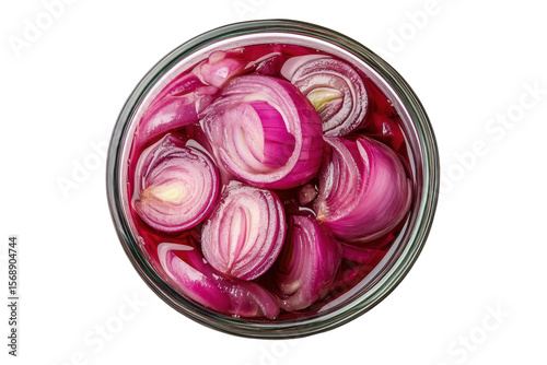 Colorful bowl of pickled red onion showcasing delightful layers and vibrant hues in a top view isolated on a clean white background