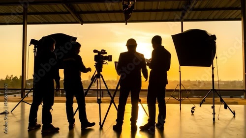 Wallpaper Mural Silhouette of a film crew working outdoors at sunrise Torontodigital.ca
