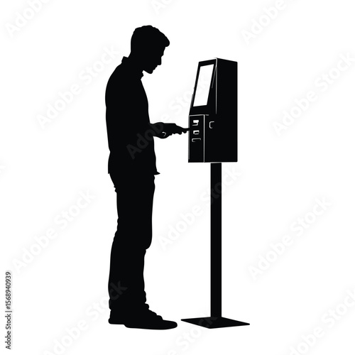 Silhouette of Man Interacting with Digital Kiosk