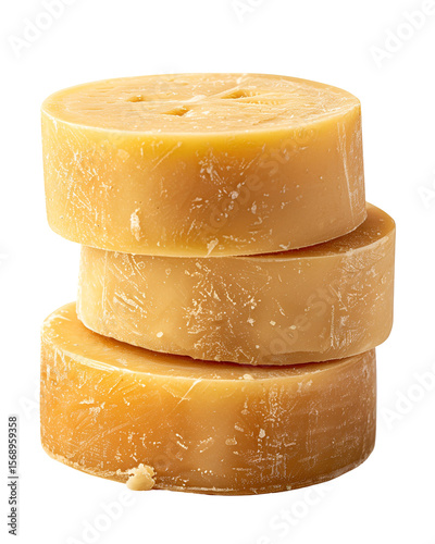 Stacked beeswax disks natural honey color texture