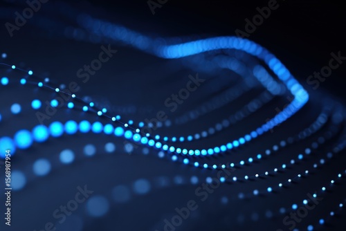 Abstract blue light trails with bokeh effect creating a wave pattern on a dark background design