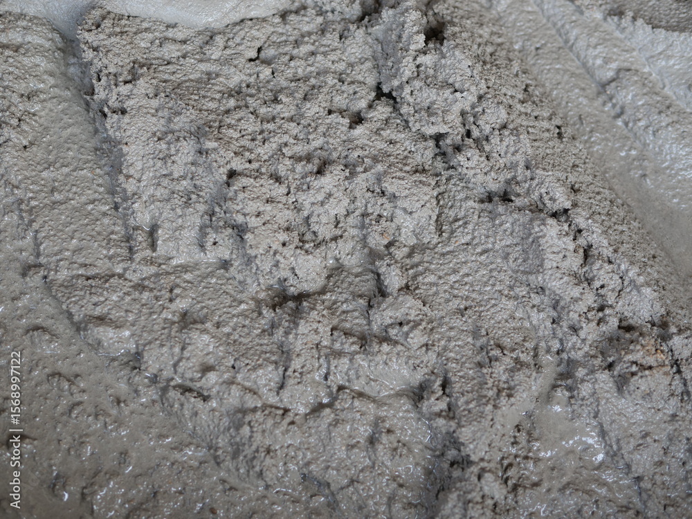 Fototapeta premium Closeup mortar cement as gray texture background for industry construction concept.