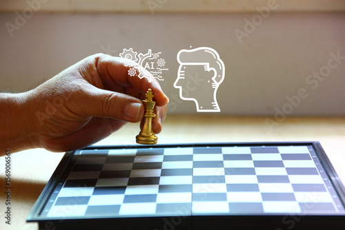 hand holding king chess on chess board. owner business using AI made busines model and create business strategy and key success, AI business concept