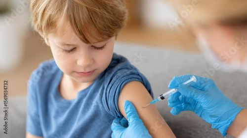 Child getting a shot in an arm