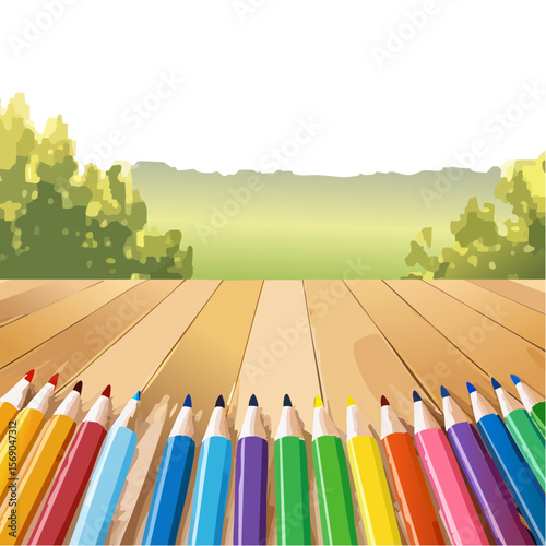 Colorful Pencils on a Wood Table with a Sunny Background