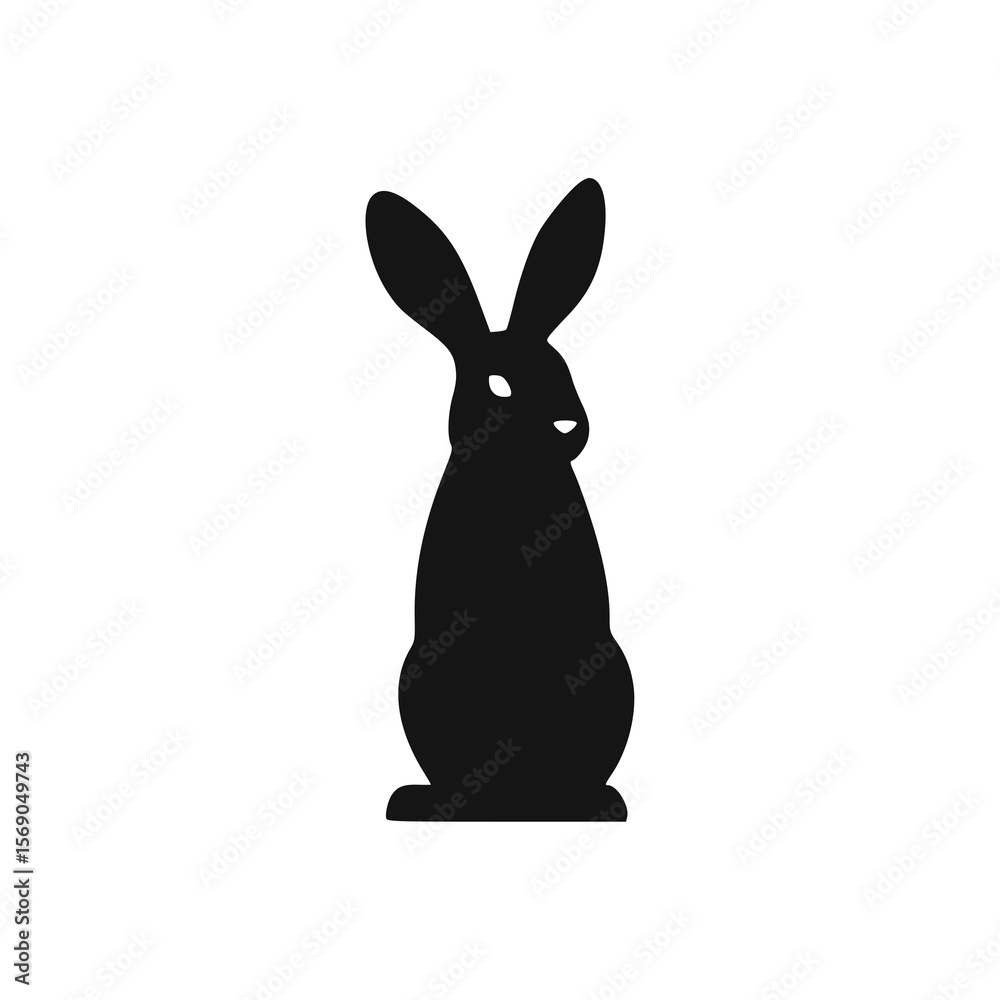Fototapeta premium Silhouette of a rabbit standing upright, facing forward with long ears.