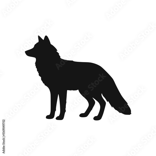 Silhouette of a fox standing alert, facing right, bushy tail.