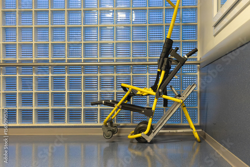 Emergency Yellow Evacuation Chair in Hospital Corridor